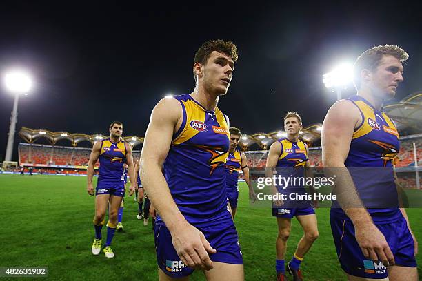 Luke Shuey and the Eagles leave the field after a draw during the round 18 AFL match between the Gold Coast Suns and the West Coast Eagles at...