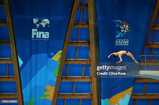 Maxim Bouchard of Canada competes in the Men's 10m Platform preliminary round on day eight of the 16th FINA World Championships at the Aquatics...