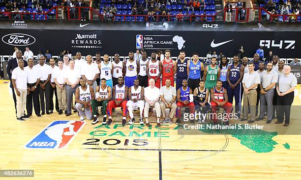 Head Coach Lionel Hollins and Assistant Coach Brad Stevens of Team World with players Chris Paul, Bradley Beal, Trey Burke, Kenneth Faried, Marc...