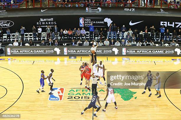 Pau Gasol of Team World jumps ball against Festus Ezeli of Team Africa during the NBA Africa Game 2015 as part of Basketball Without Boarders on...