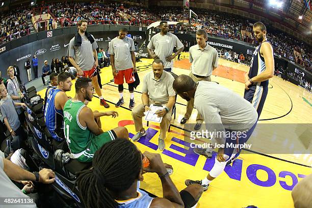 Head Coach Lionel Hollins of Team World goes over the game plan against Team Africa during the NBA Africa Game 2015 as part of Basketball Without...