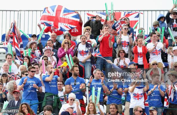 British fans cheer as they watch James Ward of Great Britain against Fabio Fognini of Italy in the first rubber of the tie during day one of the...