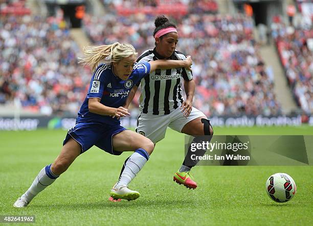 Gemma Davison of Chelsea Ladies FC tries to tackle Desiree Scott of Notts County Ladies during the Women's FA Cup Final match between Chelsea Ladies...