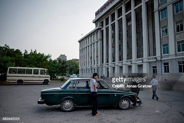 Man takes a look under the hood of an old Volvo 144 from the 70's; North Korea is still in debt with Sweden for these old cars among other things. 60...