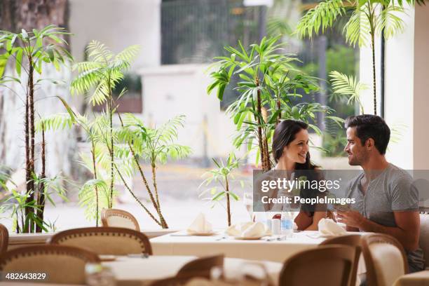 table for two - young couple dining stock pictures, royalty-free photos & images