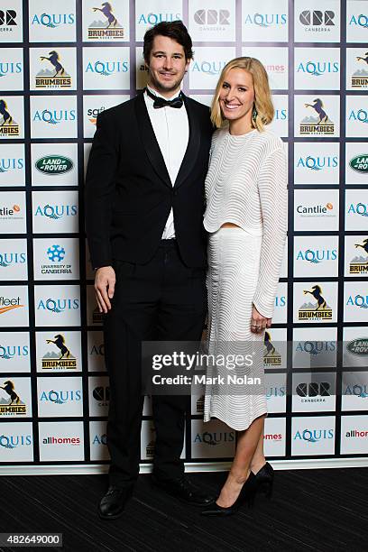 Sam Carter on the red carpet with his partner during the 2015 Brumby Presentation Dinner at the AIS on August 1, 2015 in Canberra, Australia.