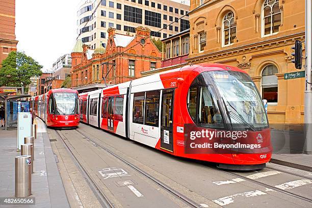 sydney light rail trams at hay street accessible stop - sydney light rail stock pictures, royalty-free photos & images