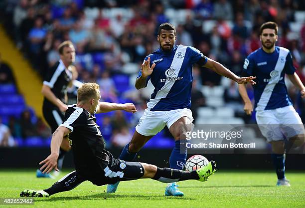 David Davies of Birmingham City is tackled by Richie De Laet of Leicester City during the Pre-Season Friendly match between Birmingham City and...