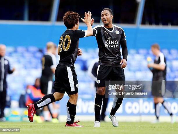 Shinji Okazaki of Leicester City celebrates with Liam Moore of Leicester City after putting the visitors ahead during the pre-season friendly between...