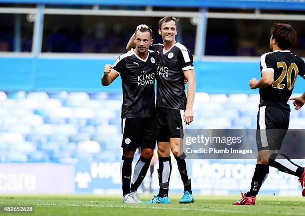 Danny Drinkwater of Leicester City celebrates with Andy King of Leicester City after scoring to make it 2-2 during the pre-season friendly between...