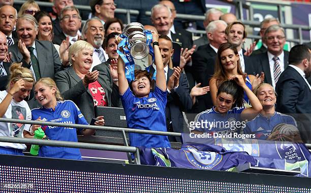 Ji So-Yun of Chelsea, who scored the winning goal, raises the trophy after their victory during the Women's FA Cup Final match between Chelsea Ladies...