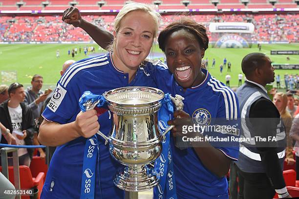 Gemma Davison and Eniola Aluko of Chelsea celebrate after the FA Cup Final match between Chelsea Ladies and Notts County Ladies at Wembley Stadium on...