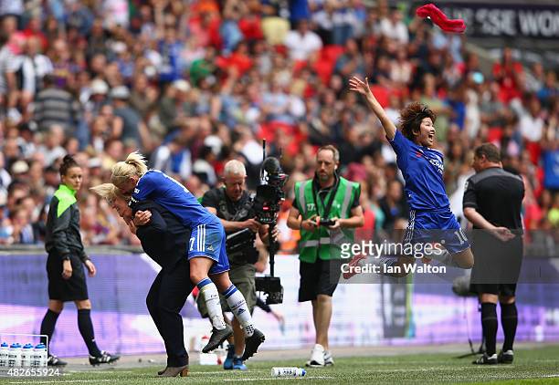 Chelsea Ladies FC manager Emma Hayes, Katie Chapman and Ji So-Yun celebrates after winning the Women's FA Cup Final match between Chelsea Ladies FC v...