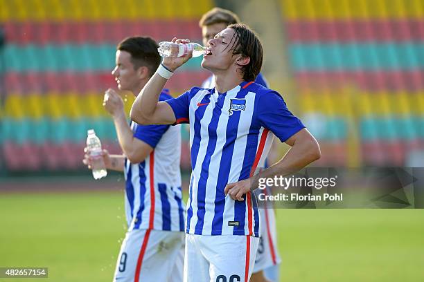 Nico Schulz of Hertha BSC drinks water during the game between Hertha BSC and CFC Genua on august 1, 2015 in Berlin, Germany.