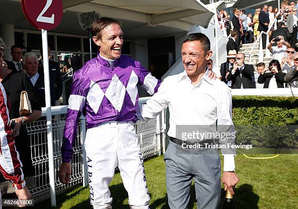 Retiring jockey Richard Hughes and Frankie Dettori on day five of the Qatar Goodwood Festival at Goodwood Racecourse on August 1, 2015 in Chichester,...