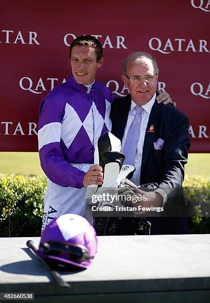 Retiring jockey Richard Hughes with Seamus Buckley, Goodwood's Clerk of the Course, on day five of the Qatar Goodwood Festival at Goodwood Racecourse...