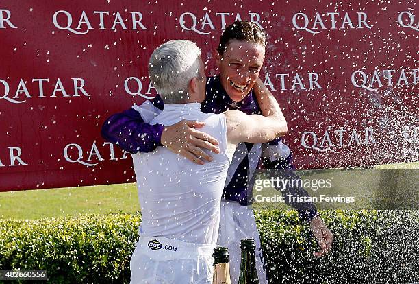 Retiring jockey Richard Hughes and jockey Franny Norton on day five of the Qatar Goodwood Festival at Goodwood Racecourse on August 1, 2015 in...