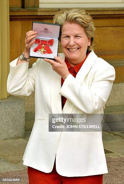 British-Danish Sandi Toksvig writer and comedian holds her OBE , ), after it was presented to her by Prince Charles, the Prince of Wales at an...