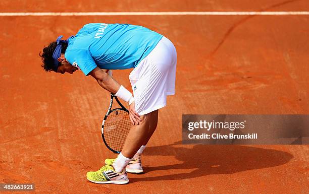 Fabio Fognini of Italy shows his frustration against James Ward of Great Britain during day one of the Davis Cup World Group Quarter Final match...