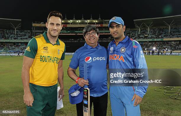 Faff Du Plessis captain of South Africa with MS Dhoni captain of India and Pepsi mascot Harry ahead of the India v South Africa semi final match at...