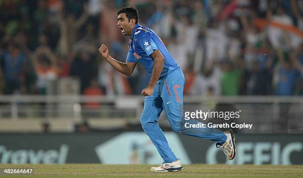 Ashwin of India celebrates dismissing AB de Villiers of South Africa during the ICC World Twenty20 Bangladesh 2014 semi final between India and South...