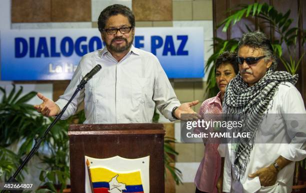 Commander of the FARC-EP leftist guerrillas Ivan Marquez reads a statement at the Convention Palace in Havana during the peace talks with the...