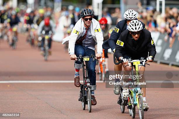 Former professional road cyclist David Millar rides during the Brompton World Championship race ahead of the Ride London Women's Grand Prix in St....