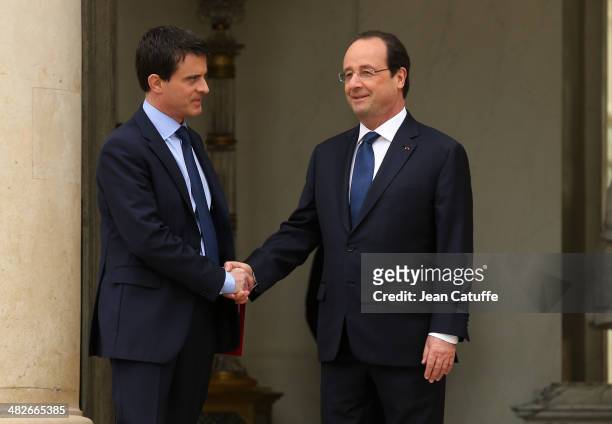 French President Francois Hollande and french Prime Minister Manuel Valls attend the first 'Conseil Des Ministres' of France new government at Elysee...