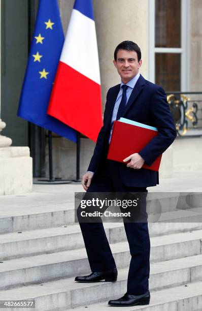 Newly appointed French Prime Minister Manuel Valls arrives to attend a cabinet meeting at the Elysee Palace on April 4, 2014 in Paris France. It is...