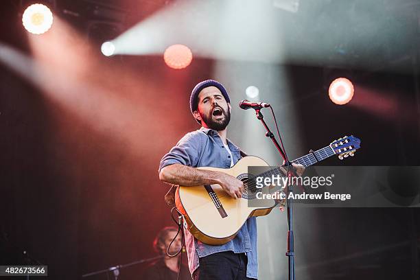 Nick Mulvey performs on the Main Stage at Kendal Calling Festival on August 1, 2015 in Kendal, United Kingdom.