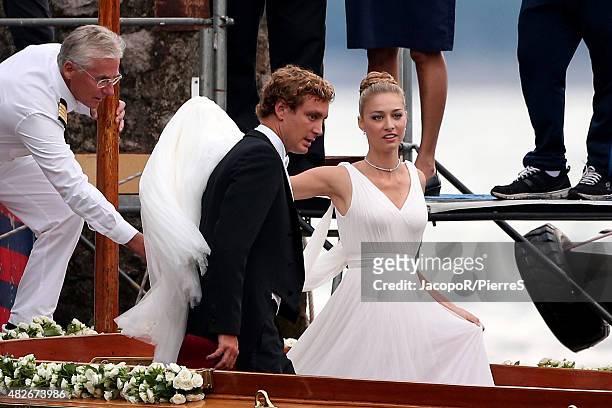 Pierre Casiraghi and Beatrice Boromeo leave Isola Madre to attend their wedding party on August 1, 2015 in Stresa, Italy.