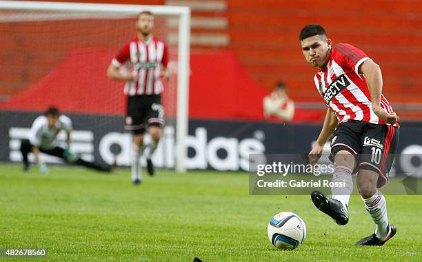 David Barbona of Estudiantes kicks the ball during a match between Estudiantes and Nueva Chicago as part of 19th round of Torneo Primera Division...