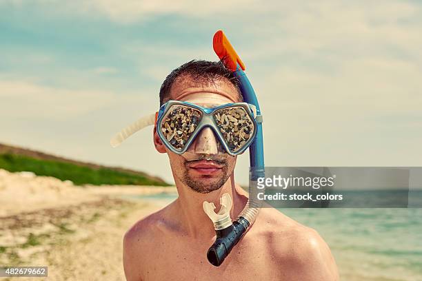 sandy swimming goggles - rubber band stockfoto's en -beelden