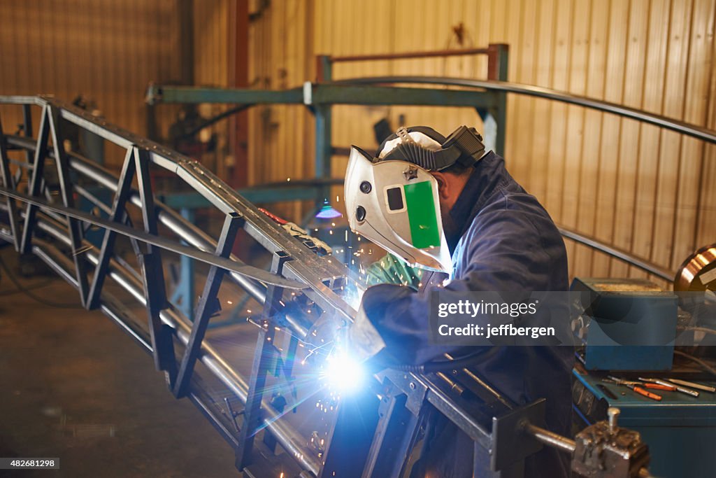 Making sure he's protected while welding