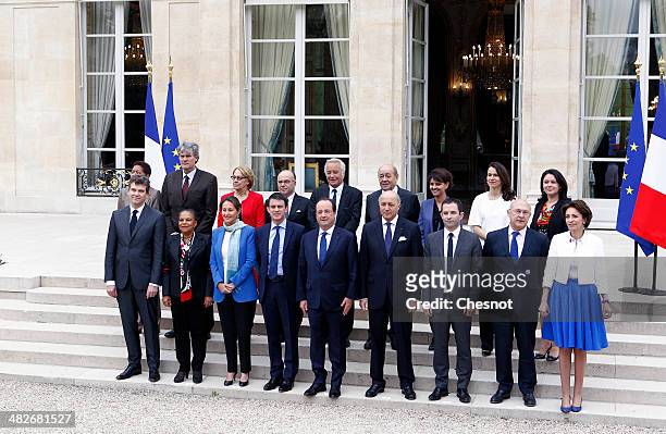 French President Francois Hollande poses with France's newly appointed Prime Minister Manuel Valls and members of the government Overseas Territories...