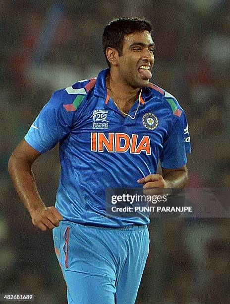 India bowler Ravichandran Ashwin celebrates after taking the wicket of South Africa batsman Faf du Plessis during the ICC World Twenty20 cricket...