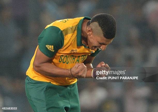 South Africa bowler Beuran Hendricks celebrates after taking the wicket of Indian batsman Rohit Sharma during the ICC World Twenty20 cricket...