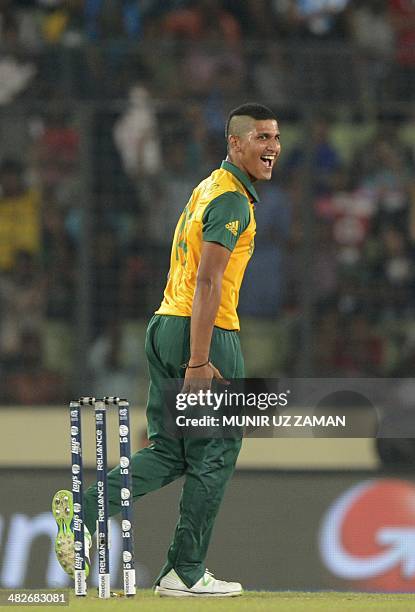 South Africa cricketer Beuran Hendricks reacts after the dismissal of India cricketer Rohit Sharma during the ICC World Twenty20 cricket tournament...