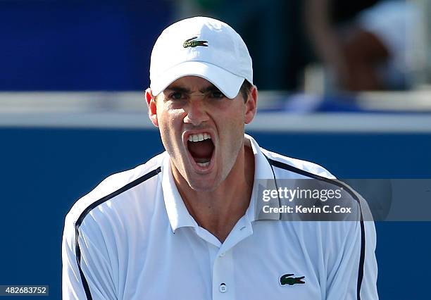 John Isner reacts after defeating Denis Kudla during the BB&T Atlanta Open at Atlantic Station on August 1, 2015 in Atlanta, Georgia.