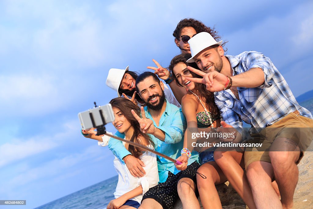 Friends self portrait on the beach