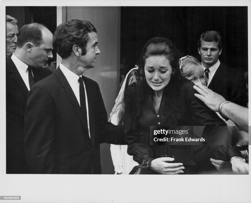 Singer Kathy Lennon, of The Lennon Sisters, being comforted at her