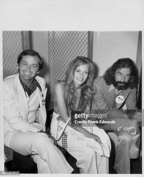 Actors Jack Nicholson and Peggy Lipton with producer Lou Adler at the Rhapsody Roses Fashion Show, April 1972.