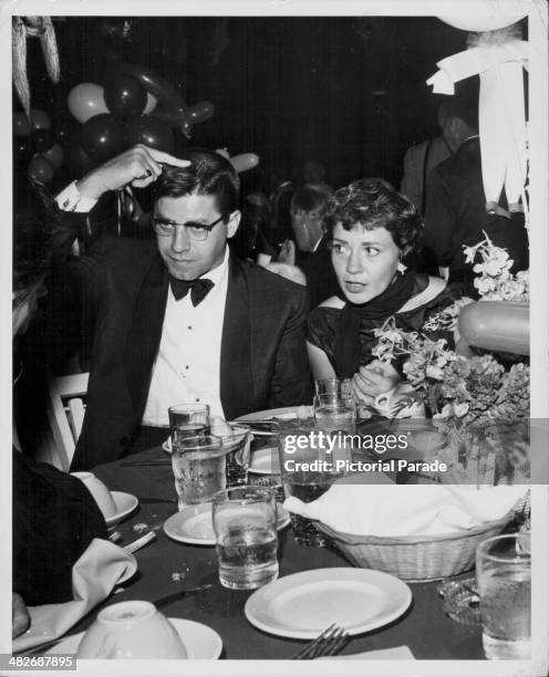 Comedy actor Jerry Lewis, at a party with his wife Patti, circa 1960-1965.