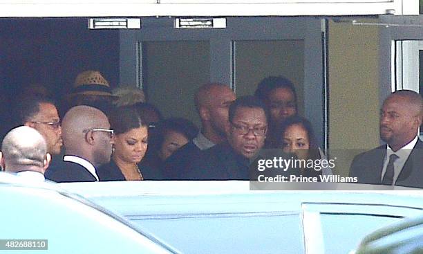 Alicia Etheredge and Bobby Brown attend the funeral of Bobbi Kristina Brown at the St. James United Methodist Church on August 1, 2015 in Alpharetta,...