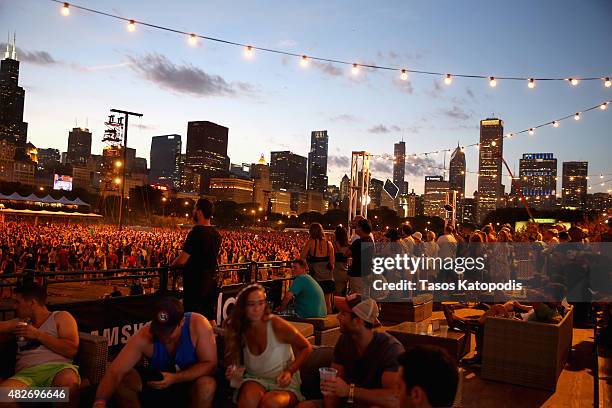 Guests enjoy the Metallica performance from the Samsung Galaxy Owner's Lounge during Lollapalooza 2015 at Grant Park on August 1, 2015 in Chicago,...
