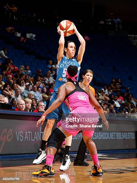 Anna Cruz of the Minnesota Lynx handles the ball against the Tulsa Shock on August 1, 2015 at the BOK Center in Tulsa, Oklahoma. NOTE TO USER: User...