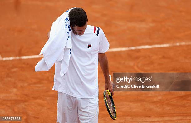 James Ward of Great Britain shows his dejection against Fabio Fognini of Italy during day one of the Davis Cup World Group Quarter Final match...