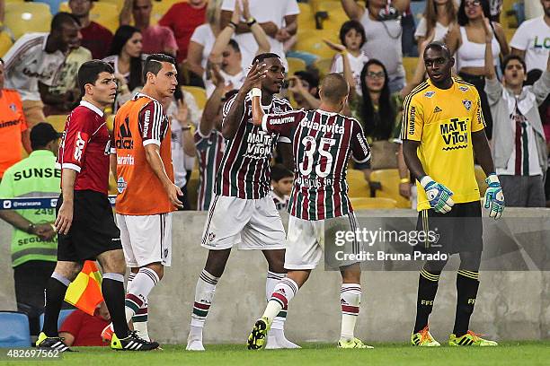 Players of Fluminense celebrate a scored goal during the Brasileirao Series A 2015 match between Fluminense and Gremio at Maracana Stadium on August...