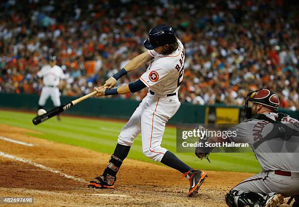 Colby Rasmus of the Houston Astros hits a single in the seventh inning during their game against the Arizona Diamondbacks at Minute Maid Park on...