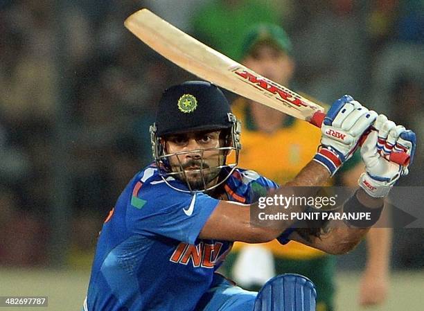 India batsman Virat Kohli plays a shot during the ICC World Twenty20 cricket tournament second semi-final match between India and South Africa at The...